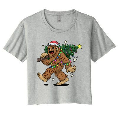 Funny Bigfoot Carrying Christmas Tree Holiday Sasquatch Women's Crop Top Tee