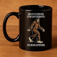 Funny Bigfoot Is Confused Often With Sasquatch Yeti Never Complains 11oz C Handle Ceramic Mug
