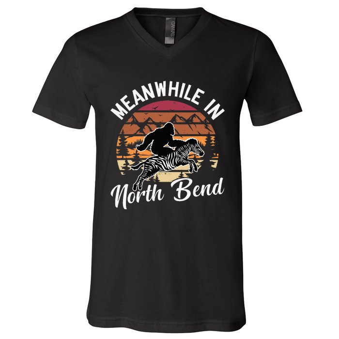 Funny Bigfoot Riding A Zebra Meanwhile In North Bend V-Neck T-Shirt