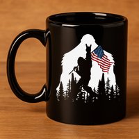 Funny Bigfoot Rock On Hold American Flag Sasquatch Believers 11oz C Handle Ceramic Mug