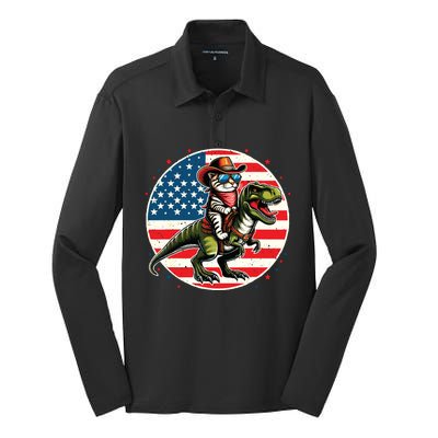 Funny Cowboy Cat Riding Dinosaur Usa Flag Trex 4th Of July Silk Touch Performance Long Sleeve Polo