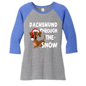 Funny Christmas Dachshund Dog Through The Snow Cool Gift Women's Tri-Blend 3/4-Sleeve Raglan Shirt