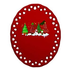 Funny Christmas Elf In Tree With Snowman Scene Ceramic Oval Ornament