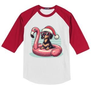 Funny Christmas In July Dachshund Dog Santa Flamingo Floatie Funny Gift Kids Colorblock Raglan Jersey