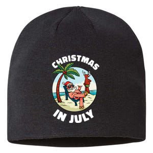 Funny Christmas In July Summer Santa On Beach Xmas Sustainable Beanie