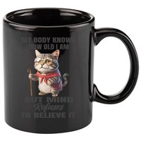 Funny Cat My Body Knows How Old I Am But Mind Refuses 11oz C Handle Ceramic Mug