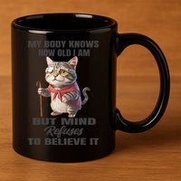 Funny Cat My Body Knows How Old I Am But Mind Refuses 11oz C Handle Ceramic Mug