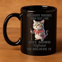 Funny Cat My Body Knows How Old I Am But Mind Refuses 11oz C Handle Ceramic Mug