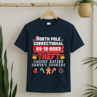 Funny Christmas North Pole Correctional Theft Caught Eating SantaS Cookies T-Shirt
