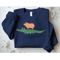 Funny Capybara Riding On A Crocodile Sweatshirt