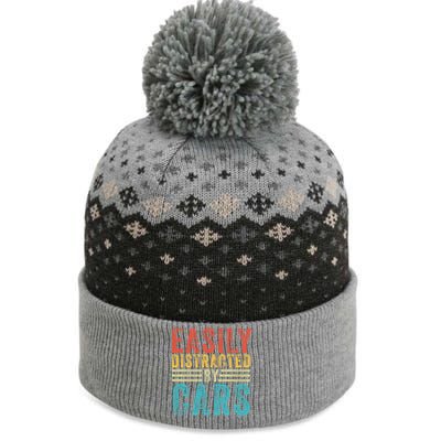 Funny Easily Distracted By Cars Auto Mechanic Racing Car Funny Gift The Baniff Cuffed Pom Beanie