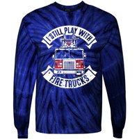 Funny Firefighter I Still Play With Fire Trucks Gift Tie-Dye Long Sleeve Shirt