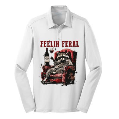 Feeling Feral Racoon Silk Touch Performance Long Sleeve Polo