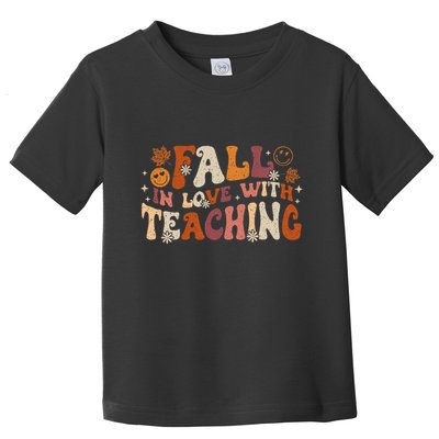 Fall In Love With Teaching Autum Thanksgiving Fall Teacher Toddler T-Shirt