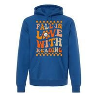 Fall In Love With Reading Books Groovy Thanksgiving Teacher Premium Hoodie