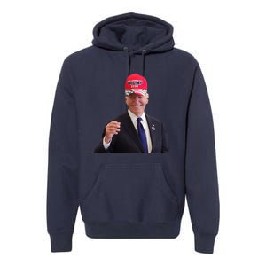 Funny Joe Biden Dons Trump 2024 Cap Wear A Trump Hat Premium Hoodie