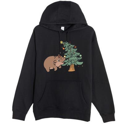 Funny Moo Deng Biting Xmas Tree Baby Pygmy Hippo Christmas Premium Pullover Hoodie