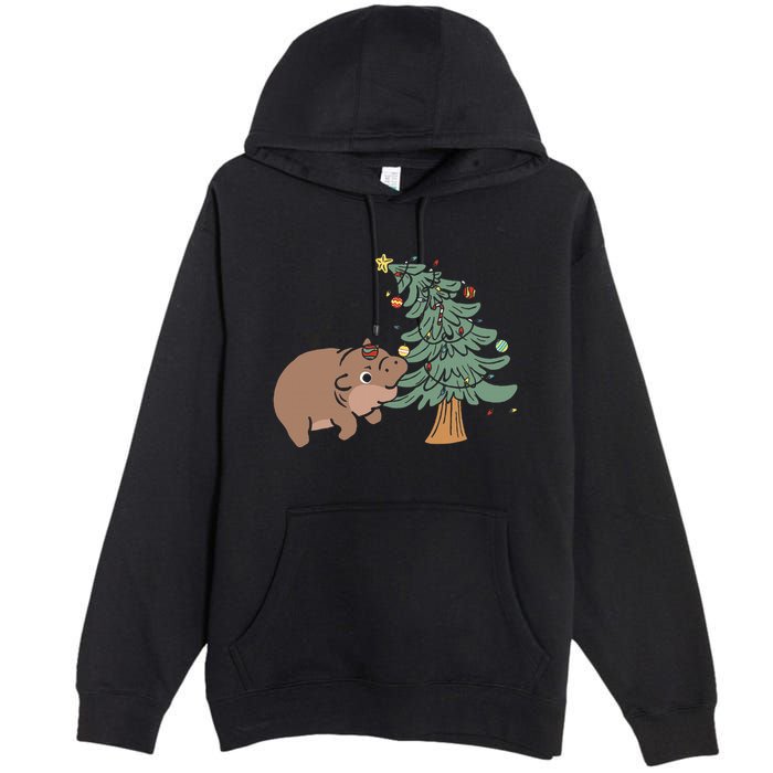 Funny Moo Deng Biting Xmas Tree Baby Pygmy Hippo Christmas Premium Pullover Hoodie