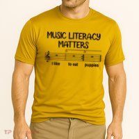 Funny Music Literacy Matters I Like To Eat Puppies Performance Shirt