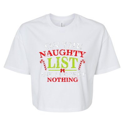 Funny On The List Of Naughty And I Regret Nothing Christmas  Bella+Canvas Jersey Crop Tee