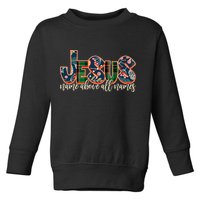 Festive Patten Jesus Name Above All Names Toddler Sweatshirt