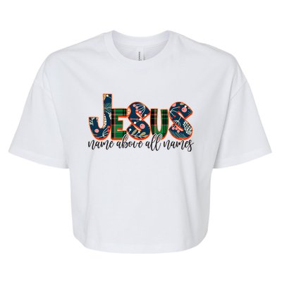 Festive Patten Jesus Name Above All Names Bella+Canvas Jersey Crop Tee