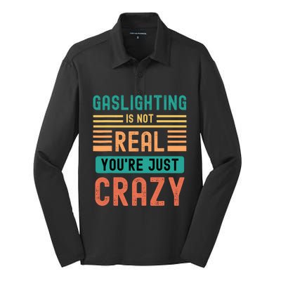 Funny Quote Gaslighting Is Not Real YouRe Just Crazy Silk Touch Performance Long Sleeve Polo