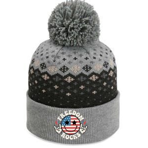 Freedom Rocks American Flag Funny Smile 4th Of July Groovy Funny Gift The Baniff Cuffed Pom Beanie