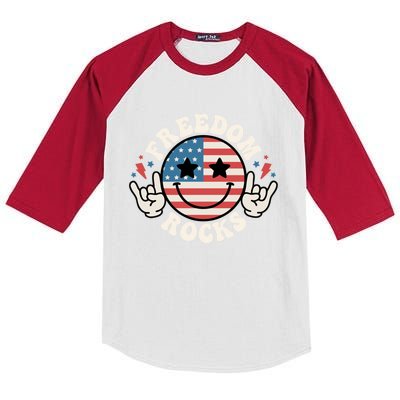 Freedom Rocks American Flag Funny Smile 4th Of July Groovy Funny Gift Kids Colorblock Raglan Jersey