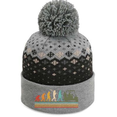 Funny Retro Evolution Of A Golfer The Baniff Cuffed Pom Beanie