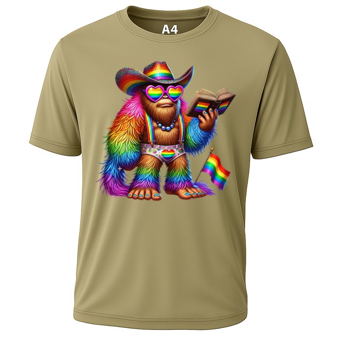 Funny Rainbow Pride Bigfoot Reading Book With Heart Glasses Cooling Performance Crew T-Shirt