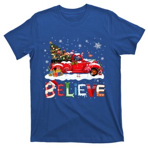 Flamingo Riding Red Truck Christmas Tree Believe Santa Gift T-Shirt