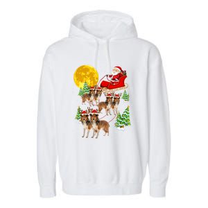 Funny Reindeer Sheltie Dogs With Santa Sleigh Xmas Holiday Funny Gift Garment-Dyed Fleece Hoodie