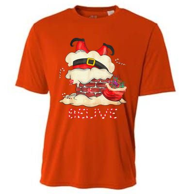 Funny Santa Claus Stuck In The Chimney Believe Christmas Cooling Performance Crew T-Shirt