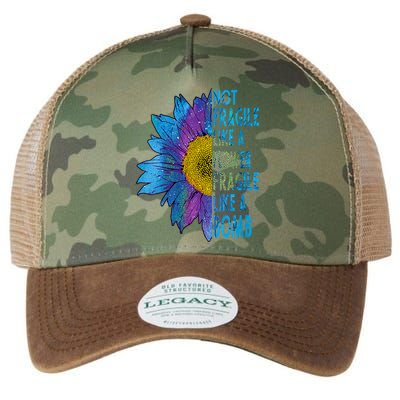 Feminist Sunflower, Not Fragile Like A Flower Fragile Like A Bomb Legacy Tie Dye Trucker Hat