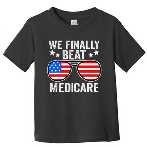 Funny Saying We Finally Beat Medicare Sunglasses Usa Flag Toddler T-Shirt