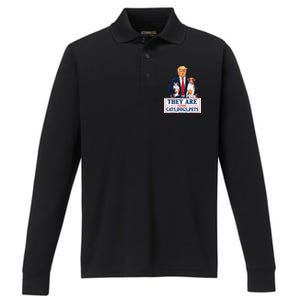 Funny They Are Eating The Dogs The Cats The Pets Trump Performance Long Sleeve Polo