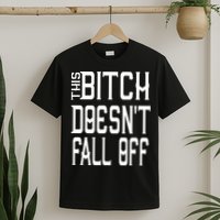 Funny THIS BITCH DOESN'T FALL OFF T-Shirt