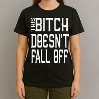 Funny THIS BITCH DOESN'T FALL OFF T-Shirt