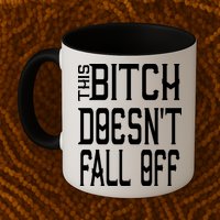 Funny THIS BITCH DOESN'T FALL OFF Mug
