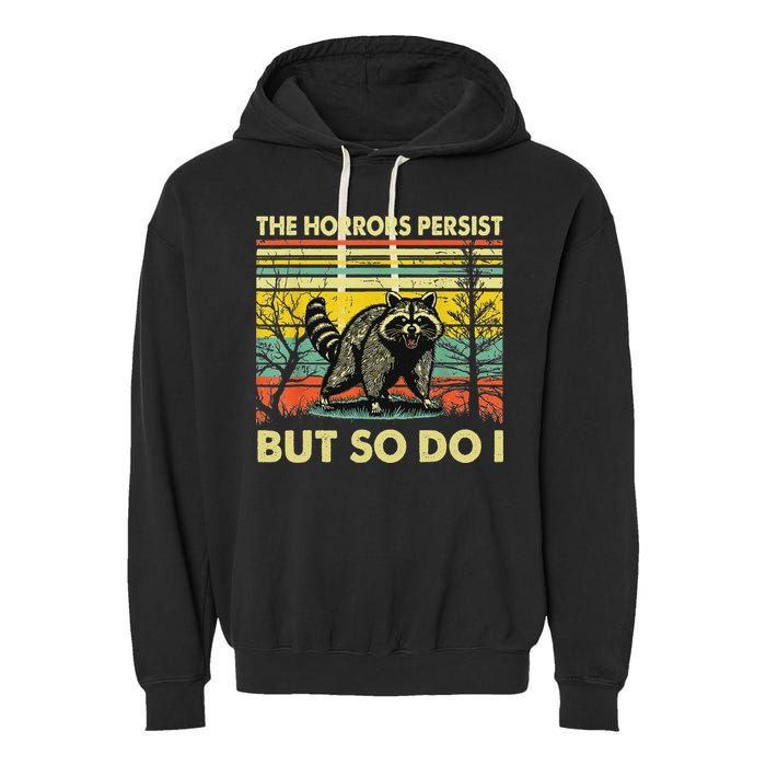 Funny The Horrors Persist But So Do Raccoon Meme Sarcastic Garment-Dyed Fleece Hoodie