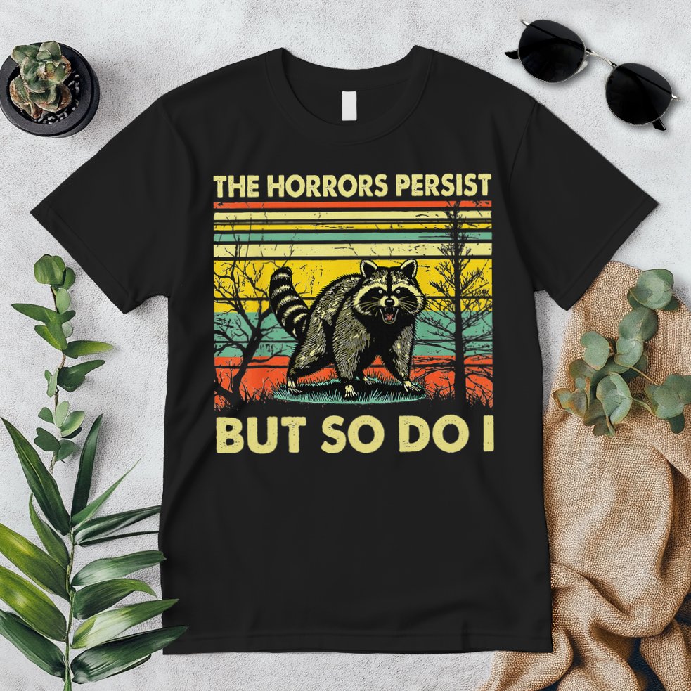 Funny The Horrors Persist But So Do Raccoon Meme Sarcastic Premium T-Shirt
