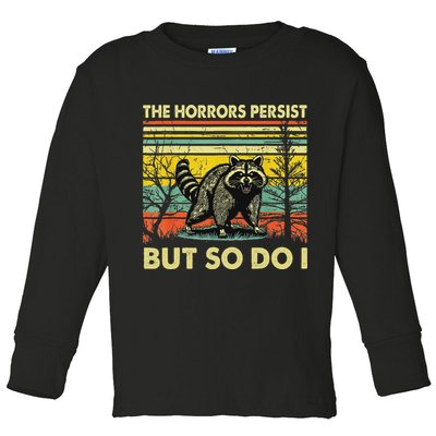 Funny The Horrors Persist But So Do Raccoon Meme Sarcastic Toddler Long Sleeve Shirt
