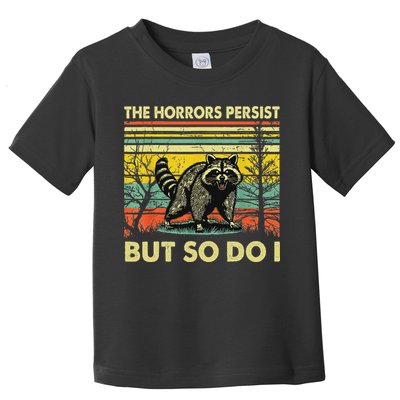 Funny The Horrors Persist But So Do Raccoon Meme Sarcastic Toddler T-Shirt