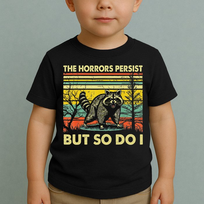 Funny The Horrors Persist But So Do Raccoon Meme Sarcastic Toddler T-Shirt
