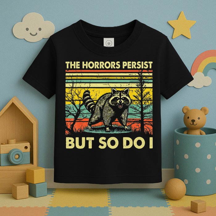 Funny The Horrors Persist But So Do Raccoon Meme Sarcastic Toddler T-Shirt