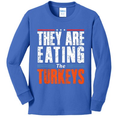 Funny Trump Saying They Are Eating The Turkeys Kids Long Sleeve Shirt