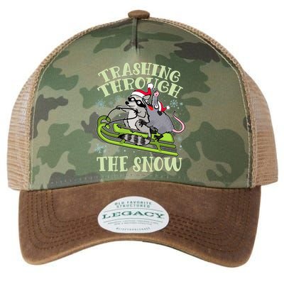 Funny Trashing Through The Snow Sleding Raccoon And Opossum Legacy Tie Dye Trucker Hat