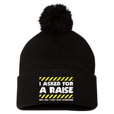 Funny Work Meme Working Overtime Funny Factory Worker Pom Pom 12in Knit Beanie
