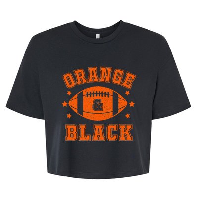 Football We Wear Orange And Black School Spirit Bella+Canvas Jersey Crop Tee